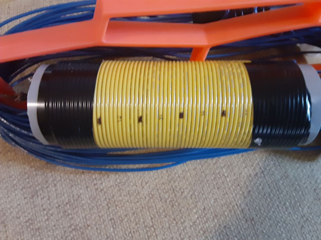 77.5uh inductor, ~63 turns of 16ga insulated wire wound on a 2 inch plastic form.